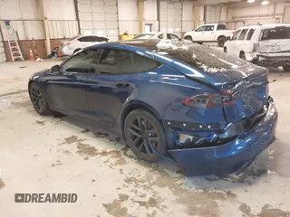 2021 Tesla Model S Plaid with VIN 5YJSA1E6XMF439884, listed as a IAAI auction lot 41622750 with Not provided miles and . Bid and sale history available at DreamBid. Image 3.