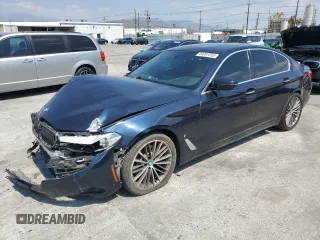 2018 BMW 5 Series 530e with VIN WBAJA9C51JB252212, listed as a Copart auction lot 54957255 with 96,000 mi miles and Salvage title. Bid and sale history available at DreamBid. Image 1.