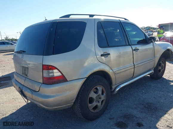 2003 Mercedes-Benz M-Class 3.7L with VIN 4JGAB57E23A453057, listed as a IAAI auction lot 41704721 with 190,649 mi miles. Bid and sale history available at carsss.com. Image 4.