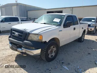 2005 Ford F-150 XLT with VIN 1FTPX14505NA67097, listed as a IAAI auction lot 42012449 with 192,258 mi miles. Bid and sale history available at carsss.com. Image 2.