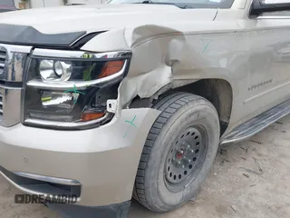 2017 Chevrolet Suburban Premier with VIN 1GNSCJKC4HR183592, listed as a IAAI auction lot 41514348 with 144,460 mi miles and . Bid and sale history available at DreamBid. Image 6.