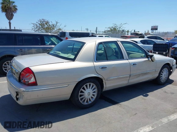 2008 Mercury Grand Marquis LS z VIN 2MEFM75V08X662376, wystawiony jako IAAI lot #42414652 z przebiegiem 86 537 mil mil oraz . Historia ofert i sprzedaży dostępna na DreamBid. Obrazek 6.