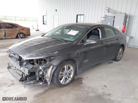 2016 Ford Fusion Energi Titanium with VIN 3FA6P0SU9GR103245, listed as a IAAI auction lot 41888435 with 123,975 mi miles. Bid and sale history available at carsss.com. Image 17.