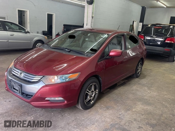 2010 Honda Insight LX with VIN JHMZE2H59AS032860, listed as a Copart auction lot 60861945 with 253,444 mi miles and Clean title. Bid and sale history available at DreamBid. Image 2.