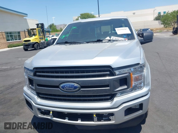 2018 Ford F-150 XL с VIN 1FTEW1CP0JKD35171, выставлен на аукционе IAAI как лот 42594307 с пробегом 123 237 миль миль и . История ставок и продаж доступна на DreamBid. Изображение 13.