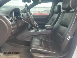 2018 Jeep Grand Cherokee Overland with VIN 1C4RJFCG5JC437508, listed as a Copart auction lot 51814795 with 104,598 mi miles and Salvage title. Bid and sale history available at DreamBid. Image 7.