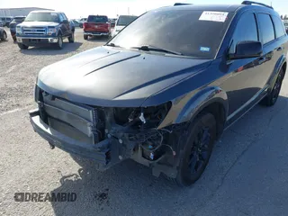2019 Dodge Journey SE with VIN 3C4PDCBG7KT872888, listed as a IAAI auction lot 41390094 with 114,513 mi miles and . Bid and sale history available at DreamBid. Image 6.