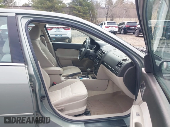 2009 Ford Fusion SEL with VIN 3FAHP08139R107400, listed as a IAAI auction lot 42045542 with 44,874 mi miles. Bid and sale history available at carsss.com. Image 5.