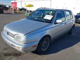 1999 Volkswagen Golf z VIN 3VWJA81HXXM215507, wystawiony jako IAAI lot #41391464 z przebiegiem 167 875 mil mil oraz . Historia ofert i sprzedaży dostępna na DreamBid. Obrazek 2.