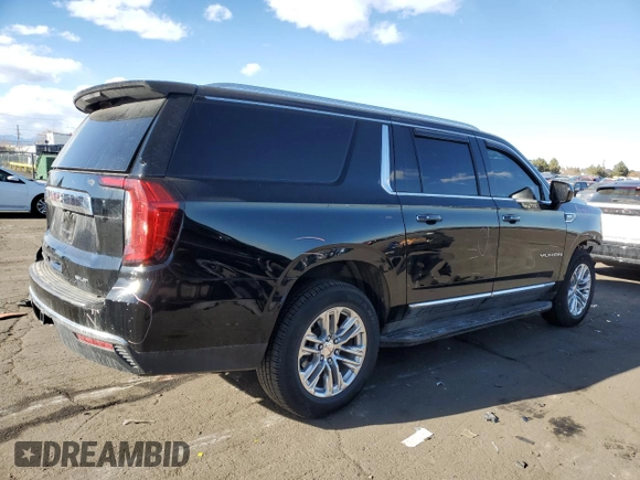 2021 GMC Yukon XL SLT with VIN 1GKS1GKD2MR243619, listed as a Copart auction lot 84262484 with 125,419 mi miles and Salvage Title. Bid and sale history available at carsss.com. Image 3.