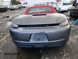 2018 Porsche 718 Boxster z VIN WP0CA2A86JS210697, wystawiony jako Copart lot #42892433 z przebiegiem 31 879 mil mil oraz . Historia ofert i sprzedaży dostępna na DreamBid. Obrazek 6.
