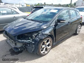2015 Ford Focus ST with VIN 1FADP3L97FL334743, listed as a IAAI auction lot 41923997 with 200,549 mi miles. Bid and sale history available at carsss.com. Image 18.