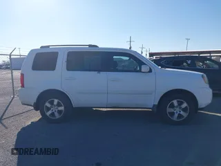 2011 Honda Pilot EX-L with VIN 5FNYF3H71BB002851, listed as a IAAI auction lot 41514961 with 150,154 mi miles and . Bid and sale history available at DreamBid. Image 13.