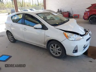 2012 Toyota Prius c One with VIN JTDKDTB35C1015176, listed as a IAAI auction lot 42053659 with 94,565 mi miles. Bid and sale history available at carsss.com. Image 1.