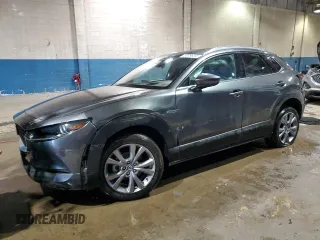 2023 Mazda CX-30 S Premium with VIN 3MVDMBDM4PM526295, listed as a Copart auction lot 88983565 with 54,991 mi miles and Non Repairable. Bid and sale history available at carsss.com. Image 1.