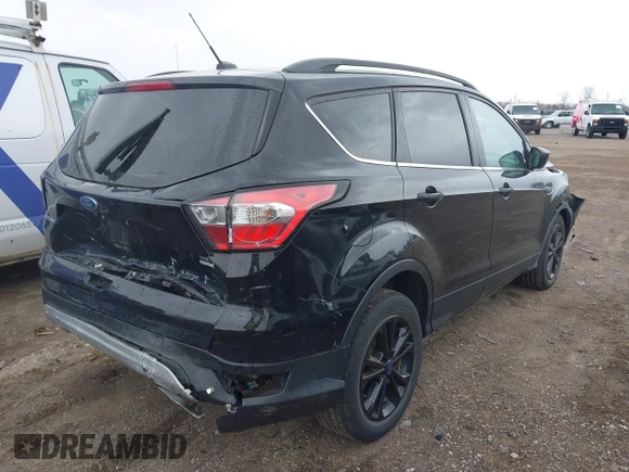 2017 Ford Escape SE with VIN 1FMCU0GD2HUD09575, listed as a IAAI auction lot 41952349 with 62,886 mi miles and . Bid and sale history available at DreamBid. Image 4.