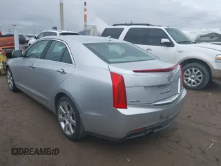 2014 Cadillac ATS Standard RWD z VIN 1G6AA5RA1E0177452, wystawiony jako IAAI lot #39138915 z przebiegiem 134 473 mil mil oraz . Historia ofert i sprzedaży dostępna na DreamBid. Obrazek 3.