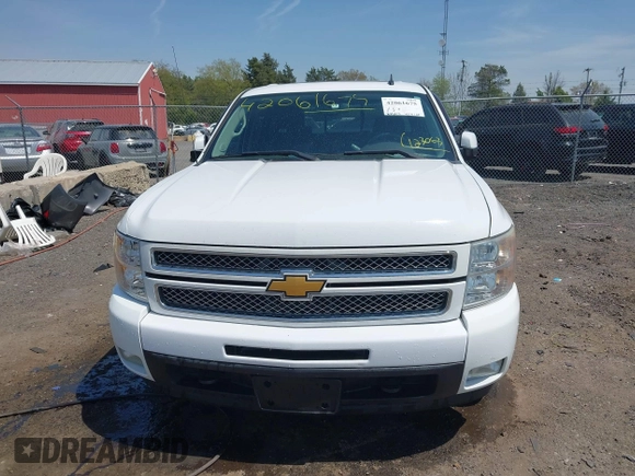 2013 Chevrolet Silverado 1500 LTZ with VIN 3GCPKTE24DG123063, listed as a IAAI auction lot 42061675 with 221,813 mi miles and . Bid and sale history available at DreamBid. Image 12.