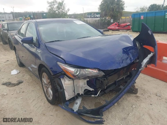 2016 Toyota Camry Hybrid LE with VIN 4T1BD1FK1GU199442, listed as a IAAI auction lot 41755284 with 137,239 mi miles. Bid and sale history available at carsss.com. Image 1.