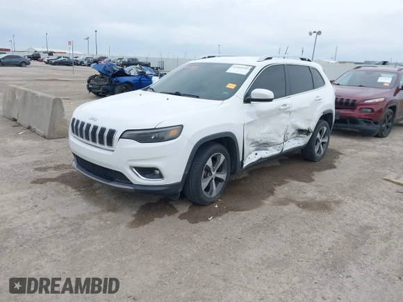 2019 Jeep Cherokee Limited with VIN 1C4PJLDB4KD346296, listed as a IAAI auction lot 41364345 with 171,855 mi miles and . Bid and sale history available at DreamBid. Image 17.
