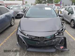 2018 Toyota Prius Plus with VIN JTDKARFP5J3095377, listed as a IAAI auction lot 42153552 with 77,255 mi miles and . Bid and sale history available at DreamBid. Image 13.