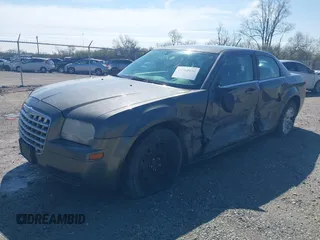 2008 Chrysler 300 LX with VIN 2C3KA43R18H122398, listed as a IAAI auction lot 41960956 with 240,960 mi miles. Bid and sale history available at carsss.com. Image 2.