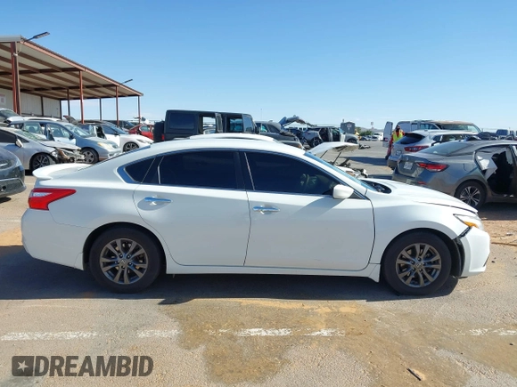 2016 Nissan Altima S z VIN 1N4AL3AP4GN382092, wystawiony jako IAAI lot #42244298 z przebiegiem 161 572 mil mil oraz . Historia ofert i sprzedaży dostępna na DreamBid. Obrazek 13.