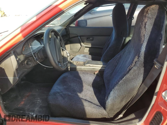 1987 Porsche 944 z VIN WP0AB0946HN476255, wystawiony jako Copart lot #79870704 z przebiegiem 177 672 mil mil oraz Czysty tytuł • Clean title. Historia ofert i sprzedaży dostępna na DreamBid. Obrazek 7.