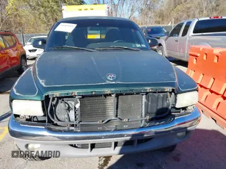 1998 Dodge Dakota SLT with VIN 1B7GG22X3WS573262, listed as a IAAI auction lot 40905093 with 148,684 mi miles and . Bid and sale history available at DreamBid. Image 6.