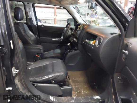 2014 Jeep Patriot Limited with VIN 1C4NJRCB8ED910340, listed as a IAAI auction lot 41396065 with 241,669 mi miles. Bid and sale history available at carsss.com. Image 5.