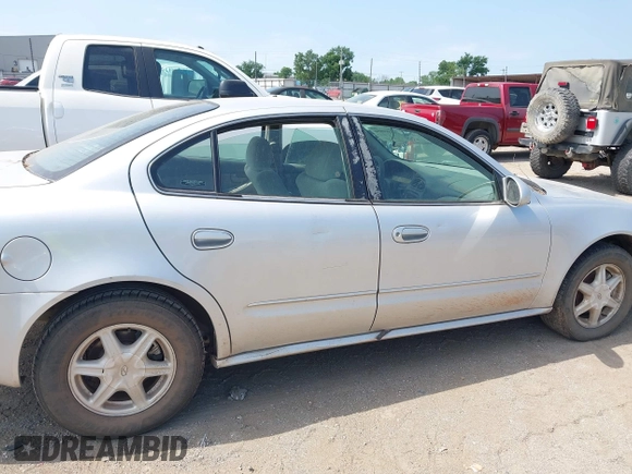 2002 Oldsmobile Alero GL1 z VIN 1G3NL52F32C213795, wystawiony jako IAAI lot #42310950 z przebiegiem Nie podano mil oraz . Historia ofert i sprzedaży dostępna na DreamBid. Obrazek 6.