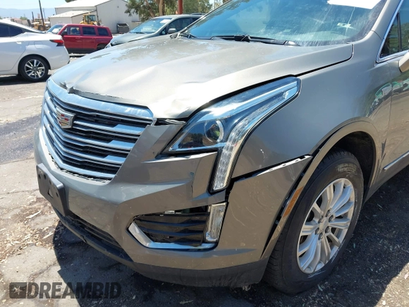 2018 Cadillac XT5 FWD with VIN 1GYKNARS5JZ242794, listed as a IAAI auction lot 42813475 with 32,266 mi miles and . Bid and sale history available at DreamBid. Image 6.
