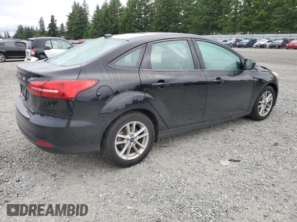 2018 Ford Focus SE z VIN 1FADP3FEXJL288116, wystawiony jako Copart lot #59629655 z przebiegiem 105 461 mil mil oraz Czysty tytuł • Clean title. Historia ofert i sprzedaży dostępna na DreamBid. Obrazek 3.