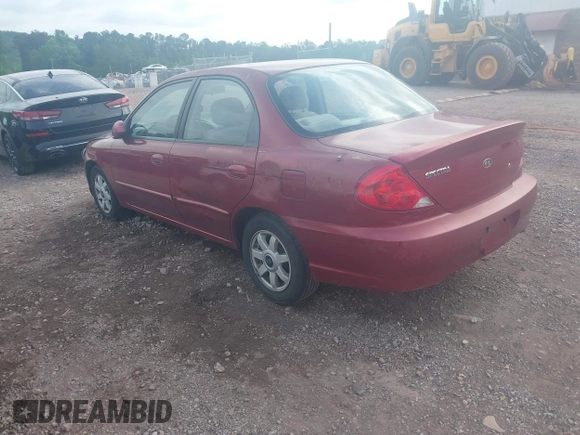 2003 Kia Spectra z VIN KNAFB121X35293054, wystawiony jako IAAI lot #42274932 z przebiegiem 108 978 mil mil oraz . Historia ofert i sprzedaży dostępna na DreamBid. Obrazek 3.