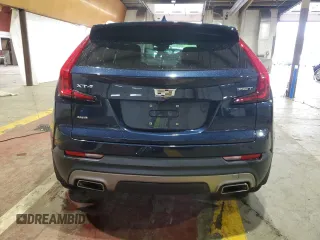 2021 Cadillac XT4 AWD Premium Luxury with VIN 1GYFZDR41MF031543, listed as a Copart auction lot 61085805 with 21,318 mi miles and Salvage title. Bid and sale history available at DreamBid. Image 6.