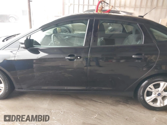 2013 Ford Focus SE with VIN 1FADP3F21DL333194, listed as a IAAI auction lot 42071641 with 107,912 mi miles. Bid and sale history available at carsss.com. Image 14.