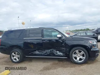 2018 Chevrolet Suburban Premier z VIN 1GNSKJKC2JR250540, wystawiony jako IAAI lot #41475451 z przebiegiem 38 751 mil mil oraz . Historia ofert i sprzedaży dostępna na DreamBid. Obrazek 13.