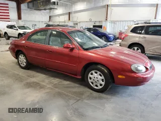 1999 Mercury Sable GS with VIN 1MEFM50U8XG639290, listed as a Copart auction lot 63098155 with 180,082 mi miles and Clean title. Bid and sale history available at DreamBid. Image 4.