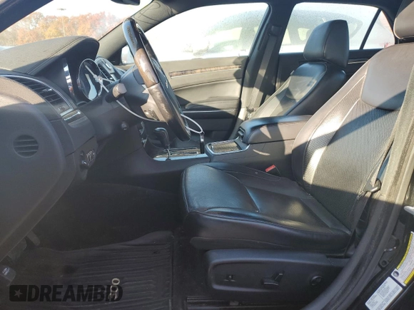 2012 Chrysler 300 C with VIN 2C3CCAKT9CH202809, listed as a Copart auction lot 79215864 with 121,610 mi miles and Salvage Title. Bid and sale history available at DreamBid. Image 7.
