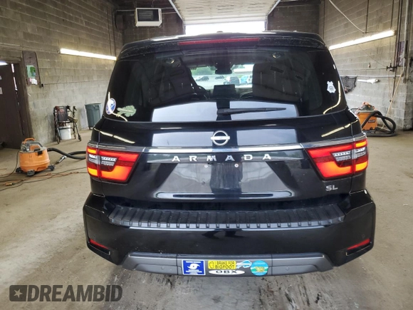 2021 Nissan Armada SL with VIN JN8AY2BBXM9795698, listed as a Copart auction lot 63000174 with 33,002 mi miles and Salvage Title. Bid and sale history available at carsss.com. Image 6.