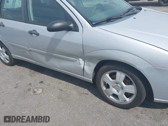 2007 Ford Focus S with VIN 1FAHP37N67W268162, listed as a IAAI auction lot 41782071 with 71,490 mi miles and . Bid and sale history available at carsss.com. Image 6.