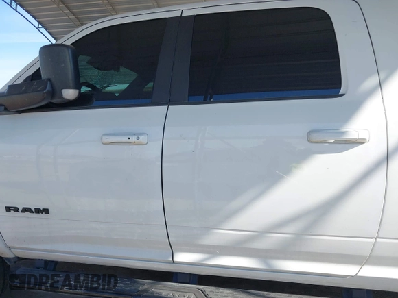 2021 Ram 2500 Laramie with VIN 3C6UR5NLXMG677847, listed as a IAAI auction lot 40992410 with 106,912 mi miles. Bid and sale history available at carsss.com. Image 14.