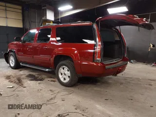 2010 Chevrolet Suburban LT z VIN 1GNUKJE32AR106197, wystawiony jako IAAI lot #42378134 z przebiegiem 106 479 mil mil oraz . Historia ofert i sprzedaży dostępna na DreamBid. Obrazek 3.