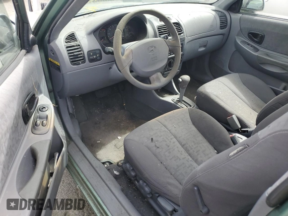2003 Hyundai Accent GL with VIN KMHCG35C13U277732, listed as a Copart auction lot 72276634 with 135,176 mi miles and Salvage Title. Bid and sale history available at carsss.com. Image 8.