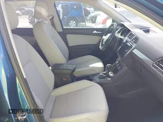 2019 Volkswagen Tiguan SE with VIN 3VV3B7AX2KM006055, listed as a IAAI auction lot 42023713 with 83,570 mi miles and . Bid and sale history available at DreamBid. Image 5.