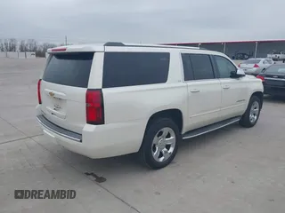 2015 Chevrolet Suburban LTZ with VIN 1GNSCKKC7FR641421, listed as a IAAI auction lot 41637137 with 139,001 mi miles and . Bid and sale history available at DreamBid. Image 4.