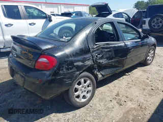 2005 Dodge Neon SXT with VIN 1B3ES56C85D143830, listed as a IAAI auction lot 41990483 with 205,947 mi miles. Bid and sale history available at carsss.com. Image 4.