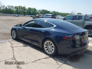2014 Tesla Model S 60 with VIN 5YJSA1H17EFP65983, listed as a IAAI auction lot 42399288 with 166,365 mi miles and . Bid and sale history available at DreamBid. Image 3.
