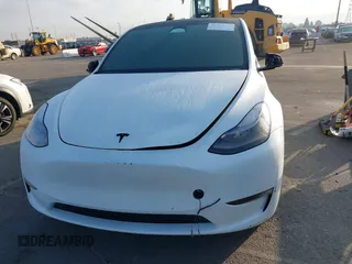 2022 Tesla Model Y Performance with VIN 7SAYGDEF1NF559572, listed as a IAAI auction lot 41516070 with 43,240 mi miles and . Bid and sale history available at DreamBid. Image 11.