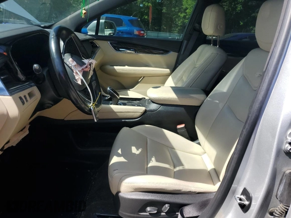 2017 Cadillac XT5 FWD с VIN 1GYKNARS9HZ107327, выставлен на аукционе Copart как лот 56099575 с пробегом 111 718 миль миль и Списание • Salvage title. История ставок и продаж доступна на DreamBid. Изображение 7.